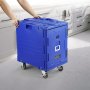person pushing a blue VEVOR insulated food pan carrier in a kitchen.