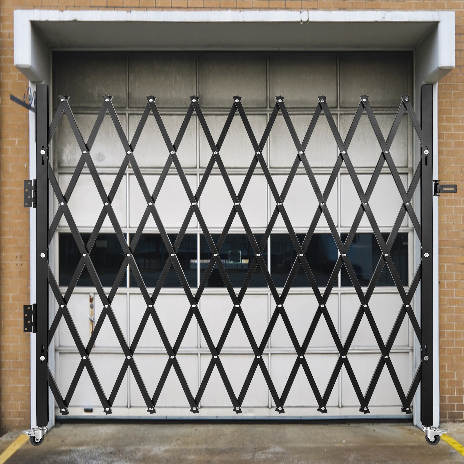 VEVOR folding security gate installed in a garage doorway, fully extended.