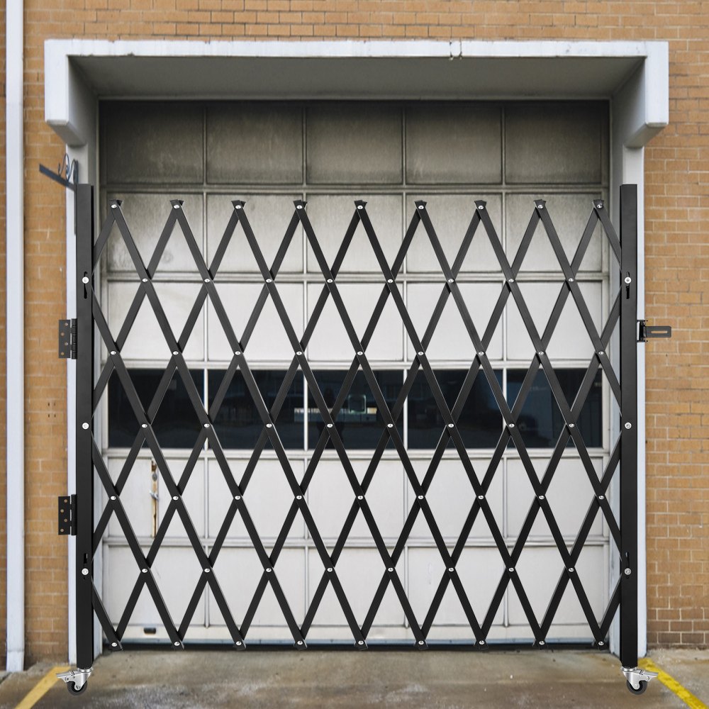 VEVOR folding security gate in black grid design, securing a garage entrance.