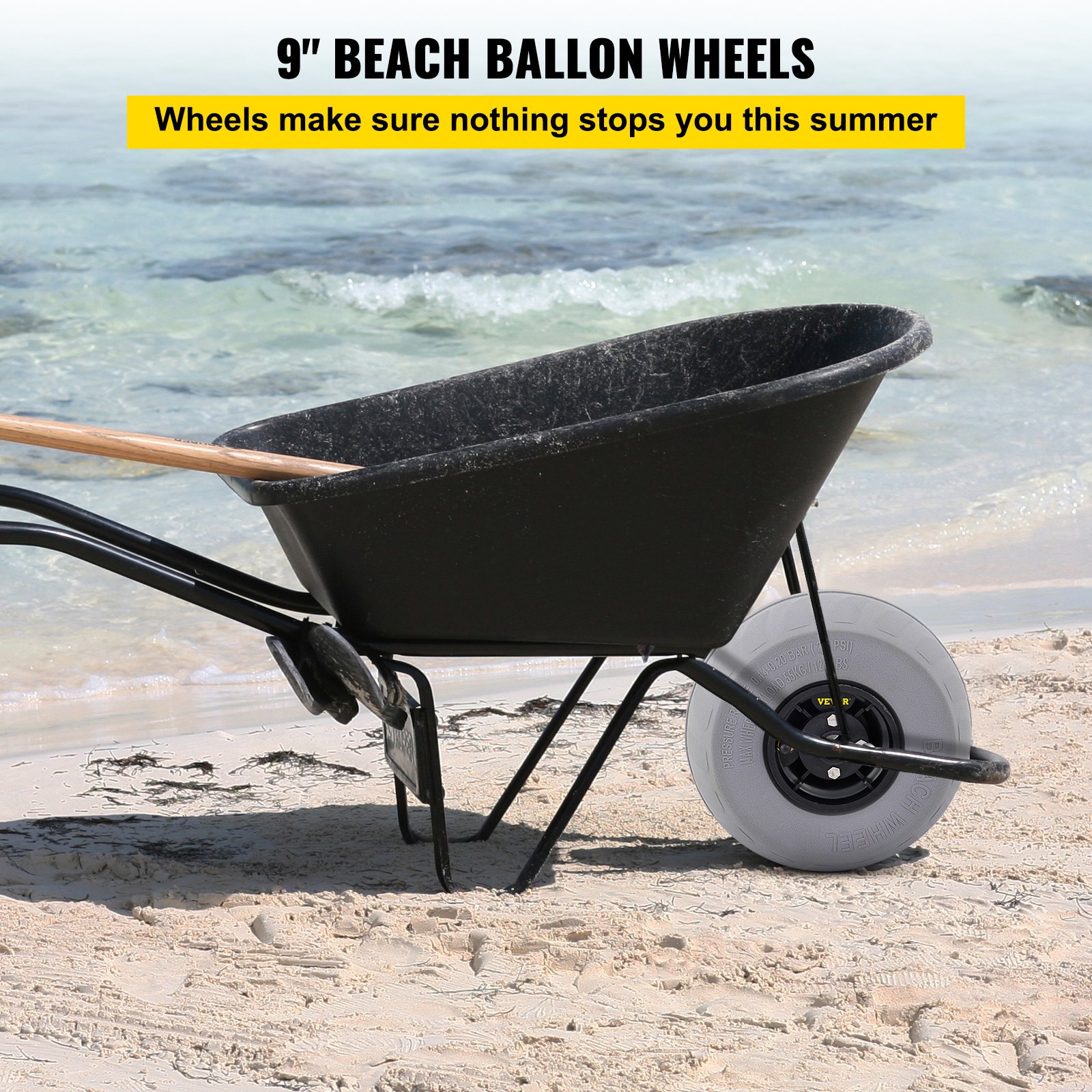 wheelbarrow with VEVOR beach balloon wheels on sandy beach by the sea.