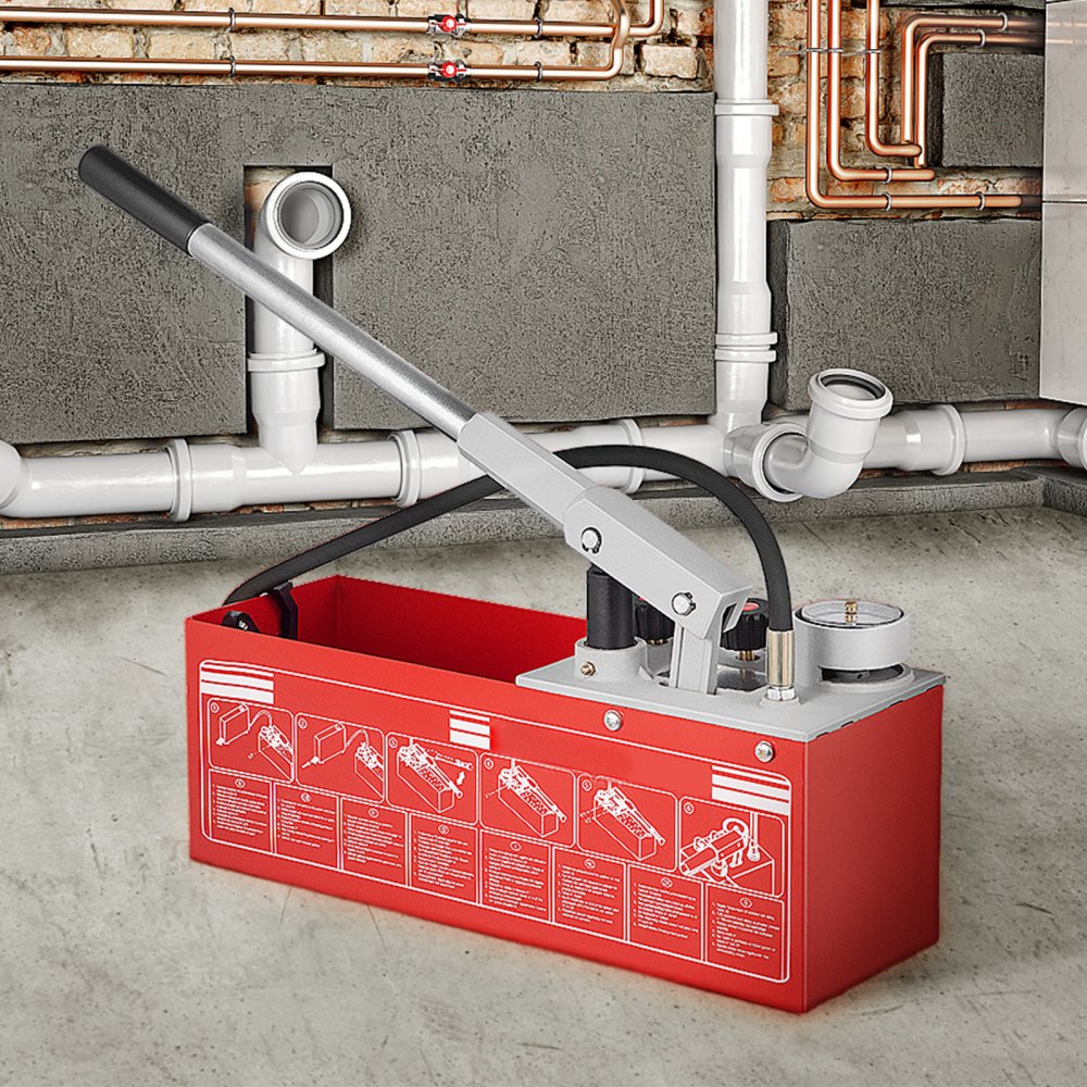 red VEVOR hydrostatic pressure test pump with pipes in industrial setting.