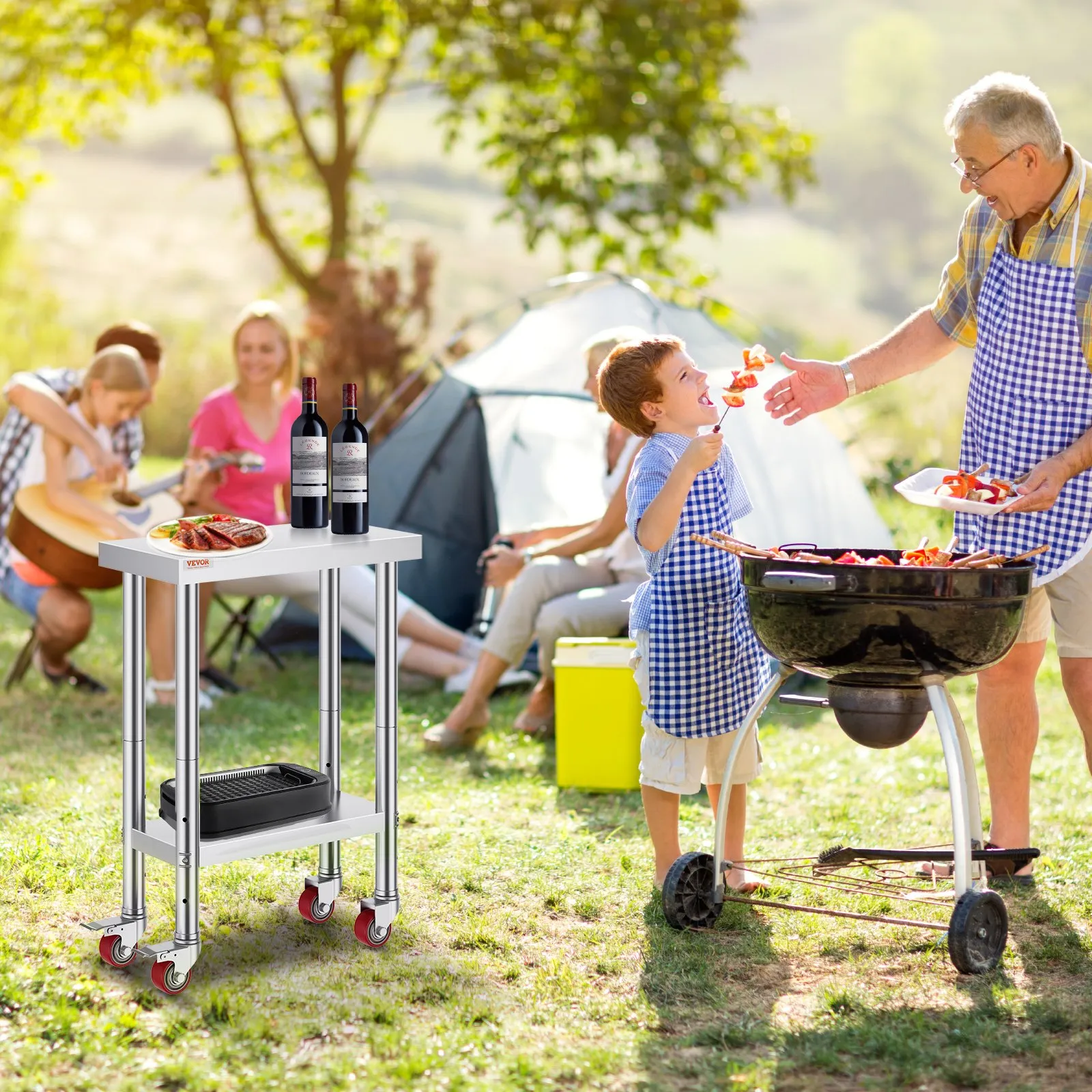 outdoor barbecue with VEVOR stainless steel work table holding wine and food near grill.