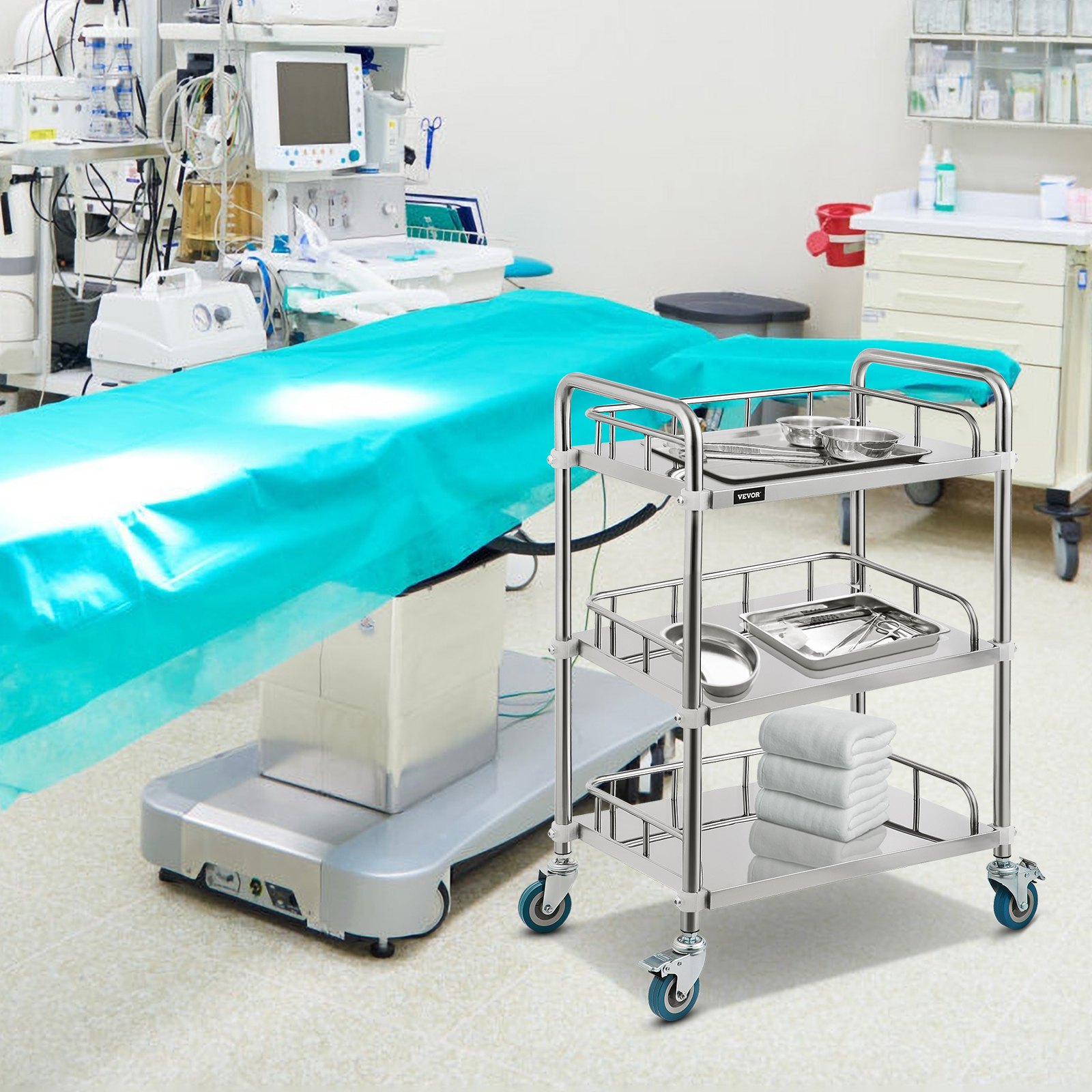 surgical room with a VEVOR lab rolling cart holding trays and towels near equipment.