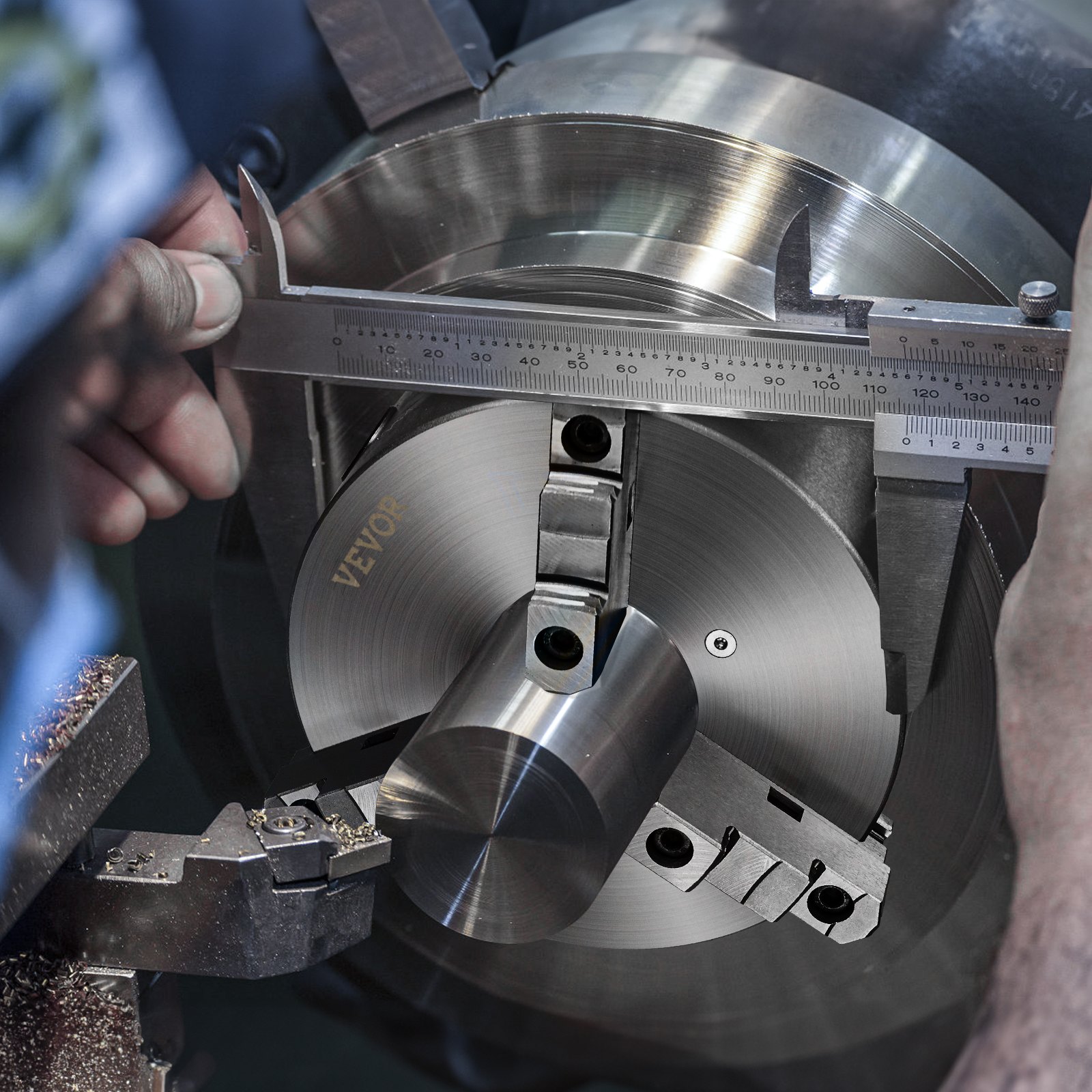 caliper measuring VEVOR 3-jaw lathe chuck during precision engineering work.