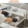 cleaning detachable blade of VEVOR electric shawarma knife under running tap water with black gloves.