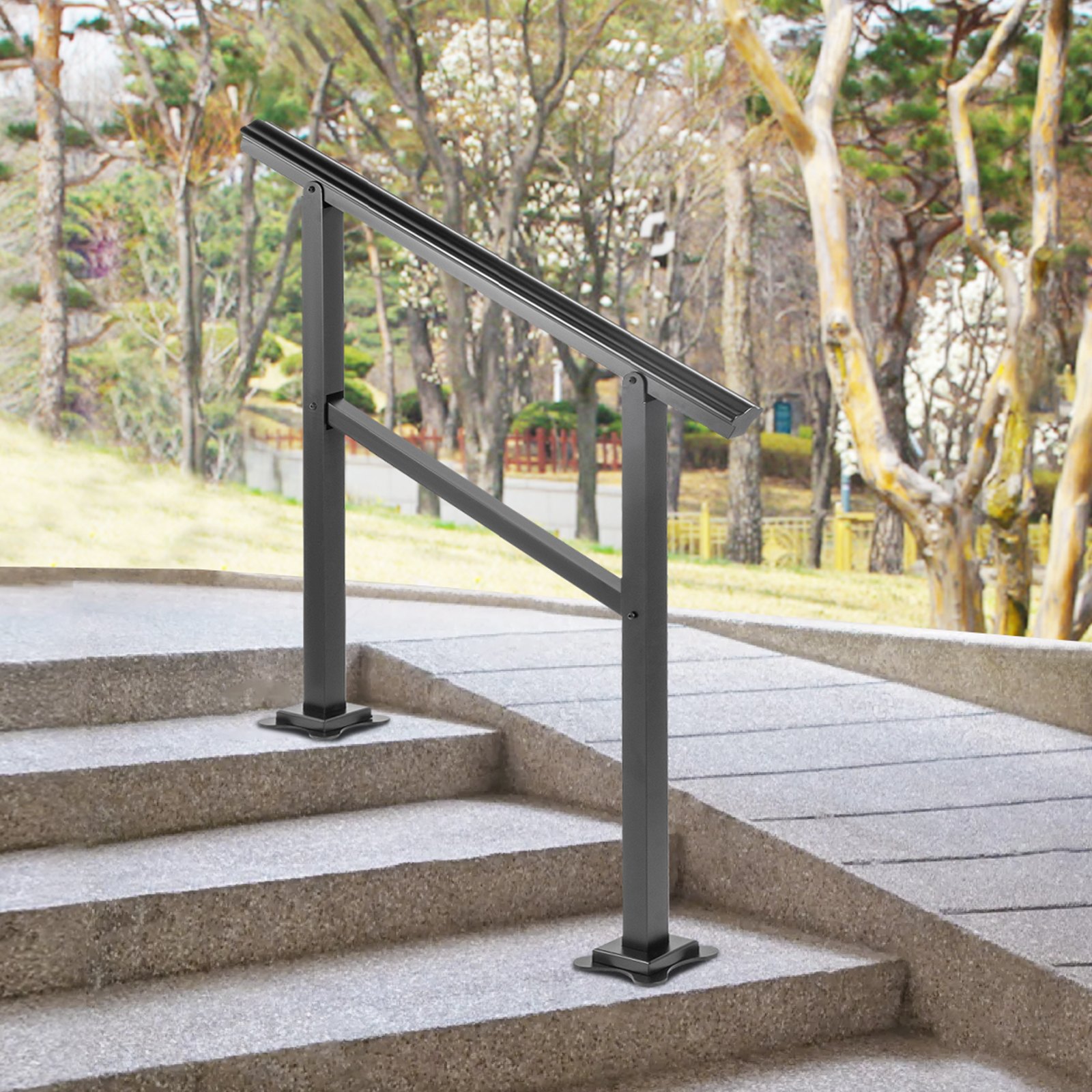 VEVOR outdoor handrail on stone steps surrounded by trees in a park.