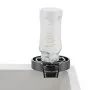 bottle on VEVOR glass rinser in white sink for easy cleaning.