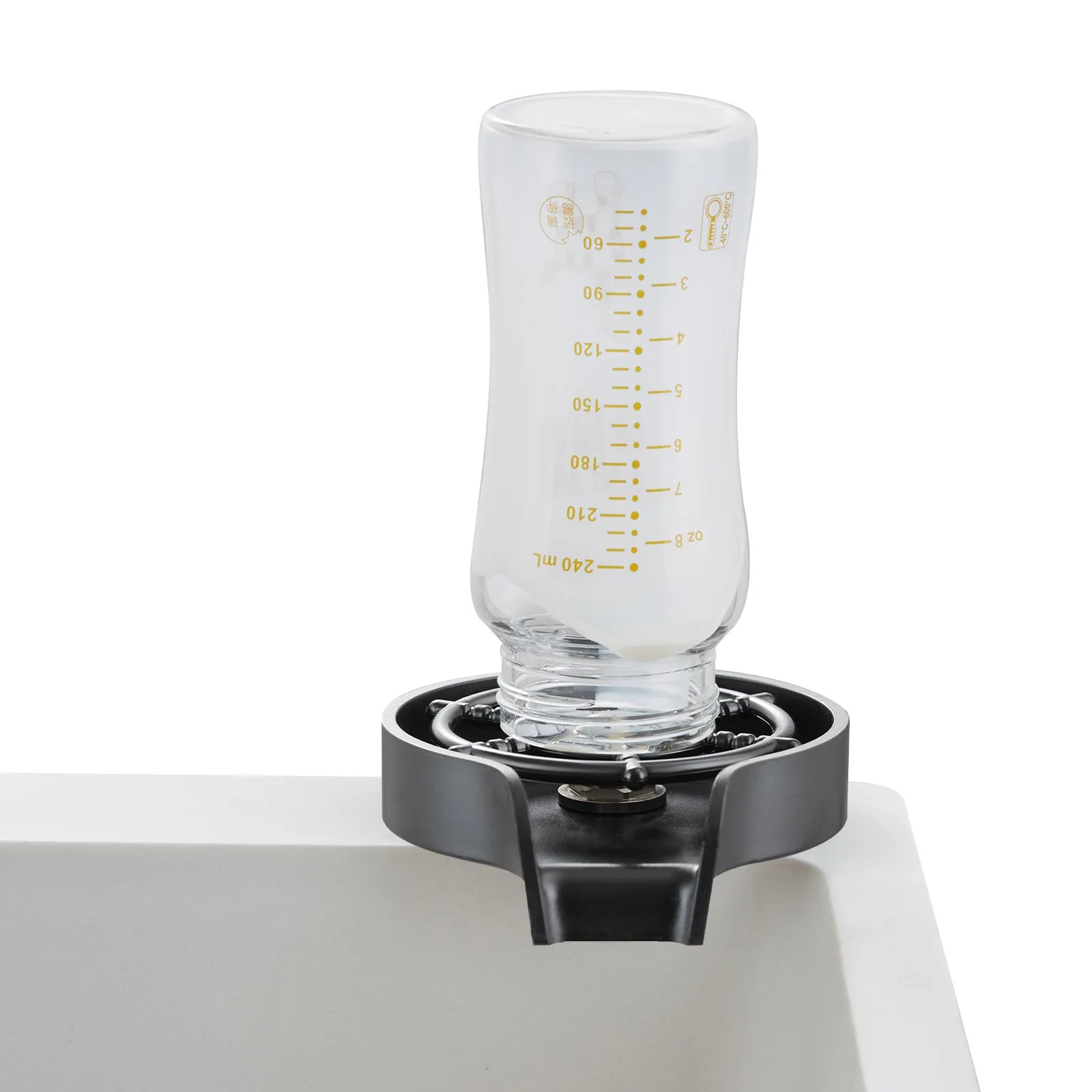 bottle on VEVOR glass rinser in white sink for easy cleaning.