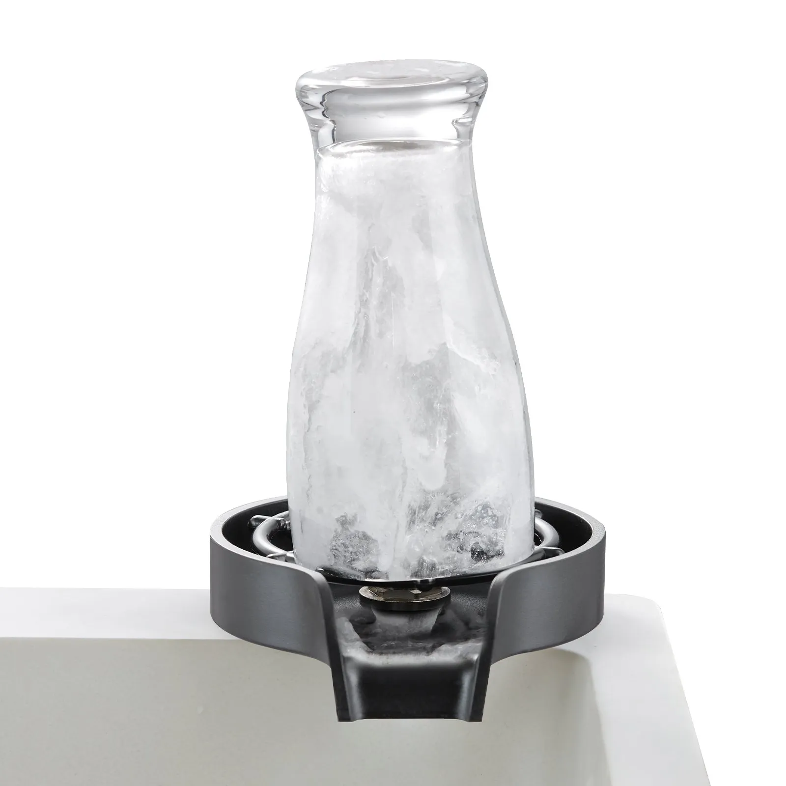 glass bottle being rinsed using VEVOR glass rinser on a kitchen sink.