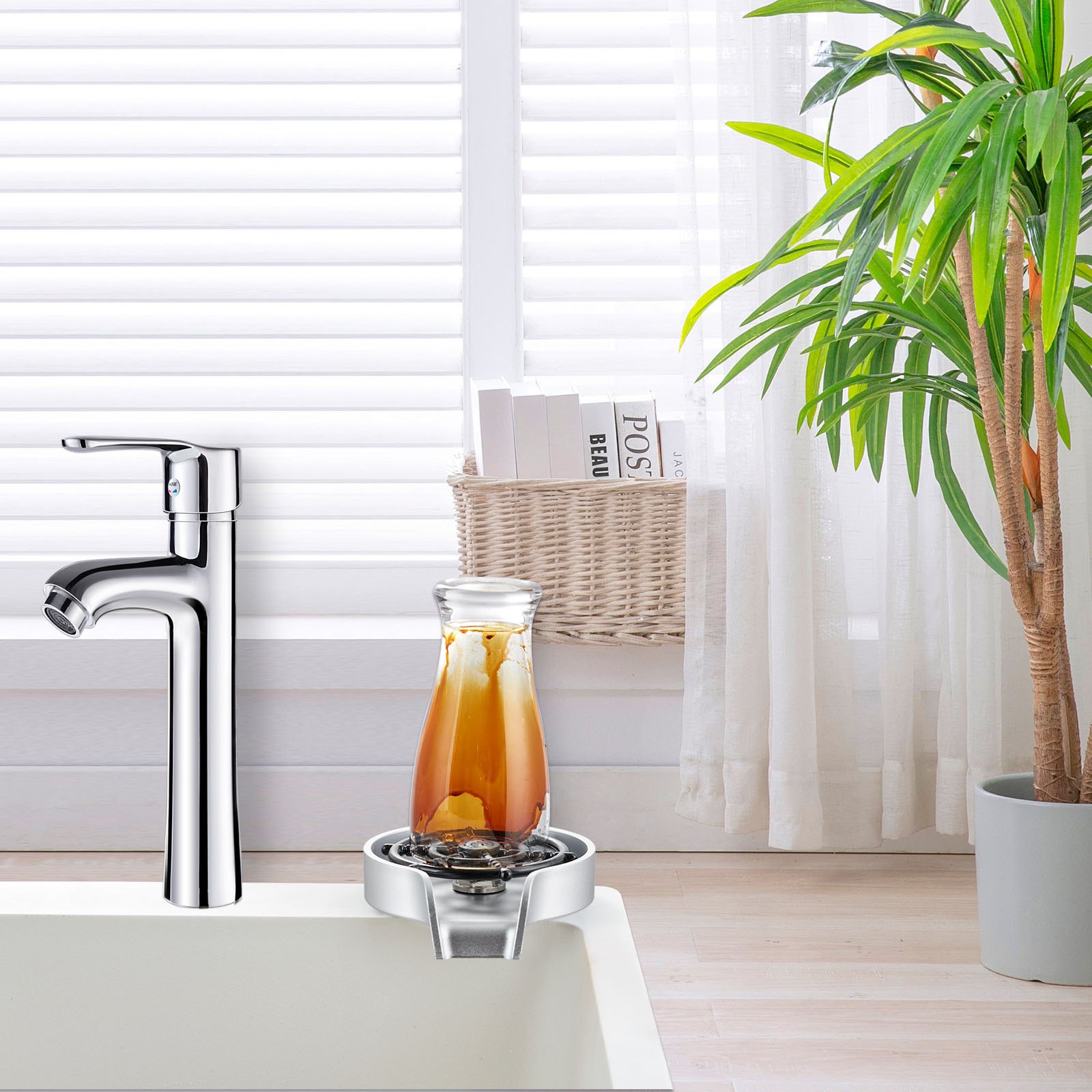 chrome faucet with VEVOR glass rinser in a modern kitchen setting, near a potted plant and books.