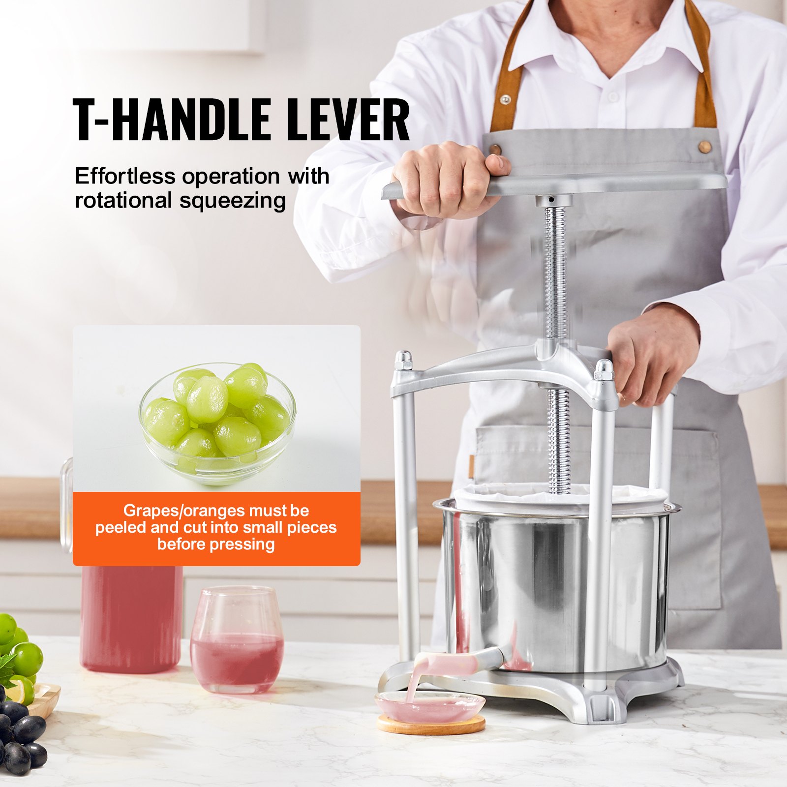 man using VEVOR fruit wine press with t-handle lever, bowl of green grapes, and juice pouring into glass.
