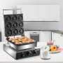 VEVOR electric donut maker in a kitchen with freshly baked donuts and a cup of coffee.
