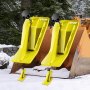 two yellow VEVOR tractor bucket protectors in a snowy outdoor setting.