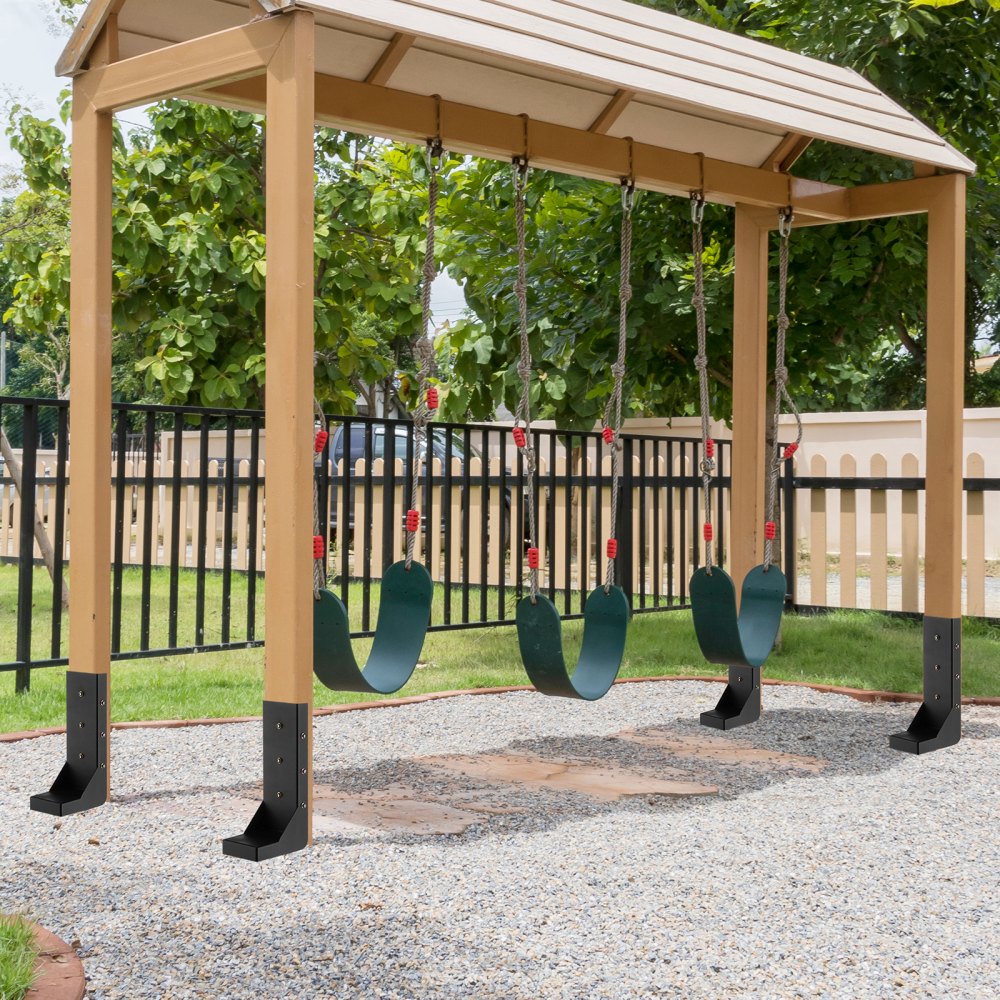playground swingset with VEVOR fence post anchor kit installed for secure anchoring on gravel surface.