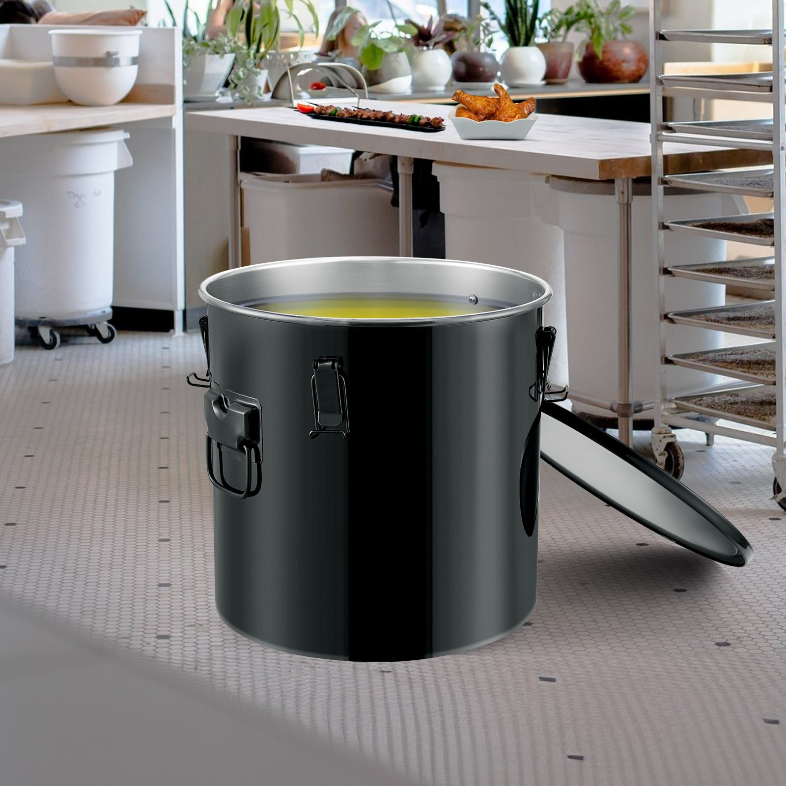 VEVOR fryer grease bucket in a commercial kitchen with frying racks and countertops.