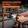 hands using VEVOR pro press tool for automatic crimping on copper pipes in an industrial setting.