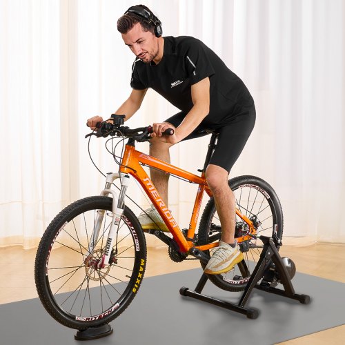 bicycle stand stationary riding VEVOR Bike Trainer, 26-29 Inch & 700C Wheels, Foldable Fluid Trainer for Indoor Exercise with Quick Release Skewer & Front Wheel Riser Block, Fits Road Bikes with a solid frame that avoids wobbling and tipping Indoor Riding Stationary Bike Stand