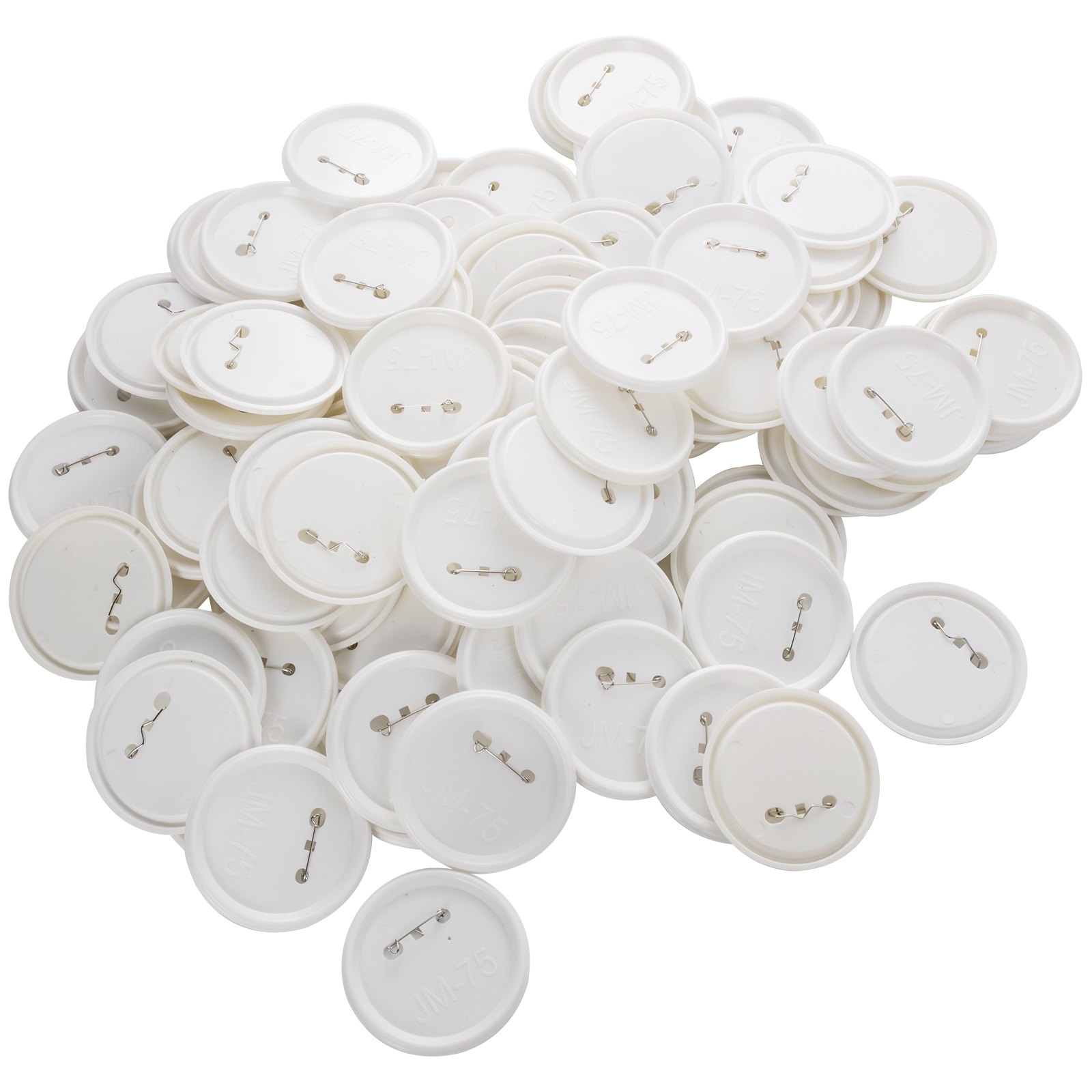 white VEVOR button maker parts with pinbacks, scattered in a pile.