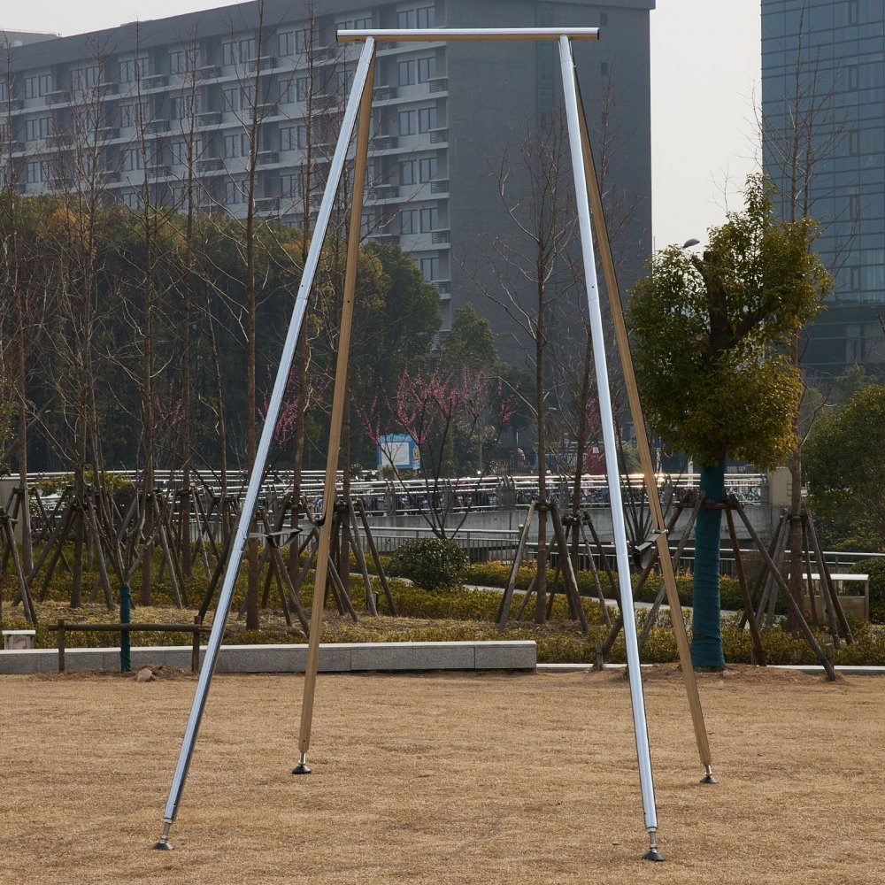 VEVOR aerial yoga frame set up outdoors with buildings and trees in the background.