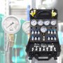 black case with gauges and fittings for VEVOR hydraulic pressure test kit against industrial backdrop.