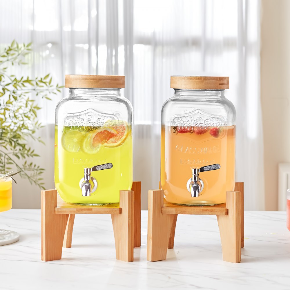 two VEVOR beverage dispensers with wooden stands and fruit-infused drinks on a white countertop.