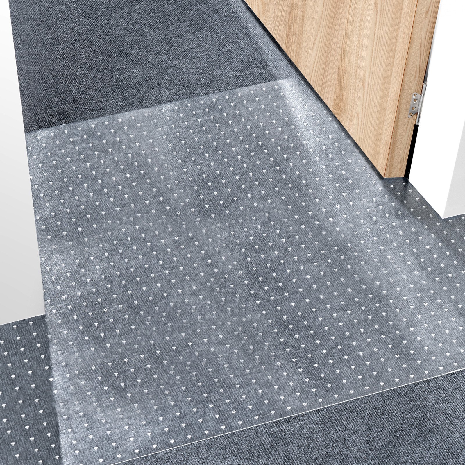VEVOR carpet protector for pets in a hallway with wooden door, showcasing clear plastic mat on dark carpet.