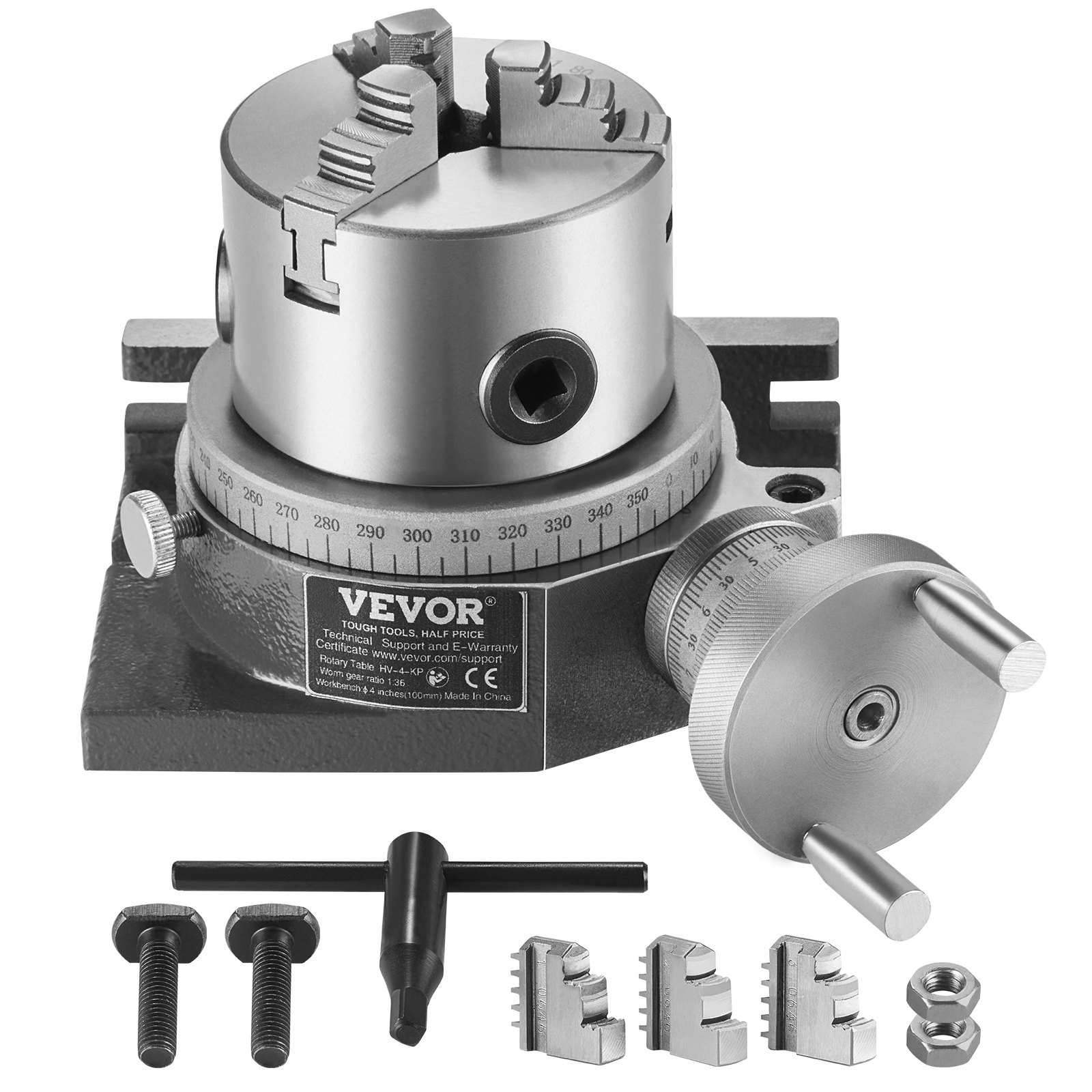 VEVOR rotary table with adjustment dials, accessories, and additional parts on display.