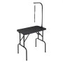 black VEVOR pet grooming table with adjustable arm and non-slip tabletop.