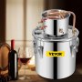stainless steel VEVOR distiller kit with wine bottle, glass, and wooden barrel.