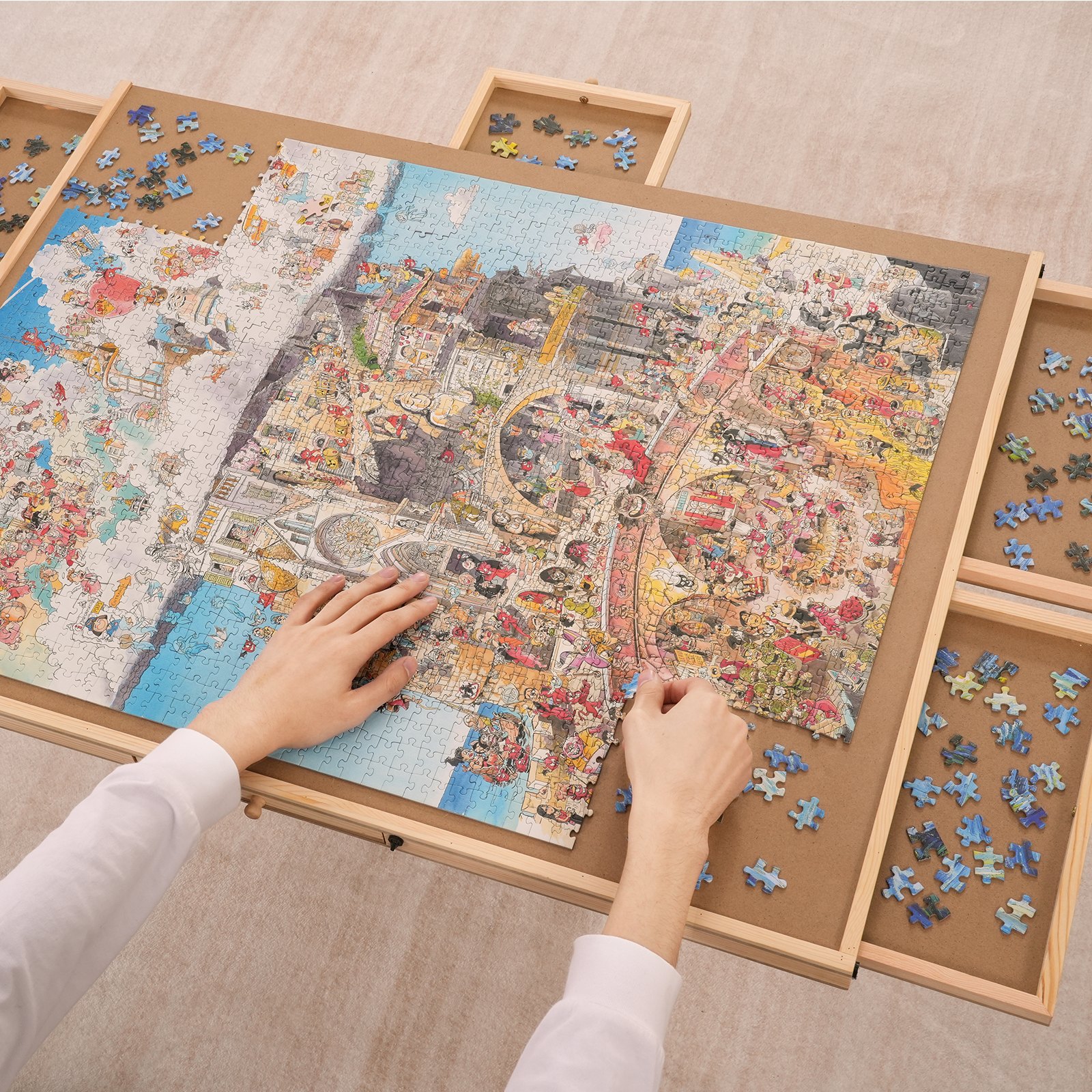 hands assembling a colorful jigsaw puzzle on a VEVOR puzzle board, surrounded by sorted pieces.