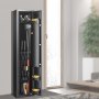 gun safe with rifles and ammunition inside, placed in a modern living room near a large window.