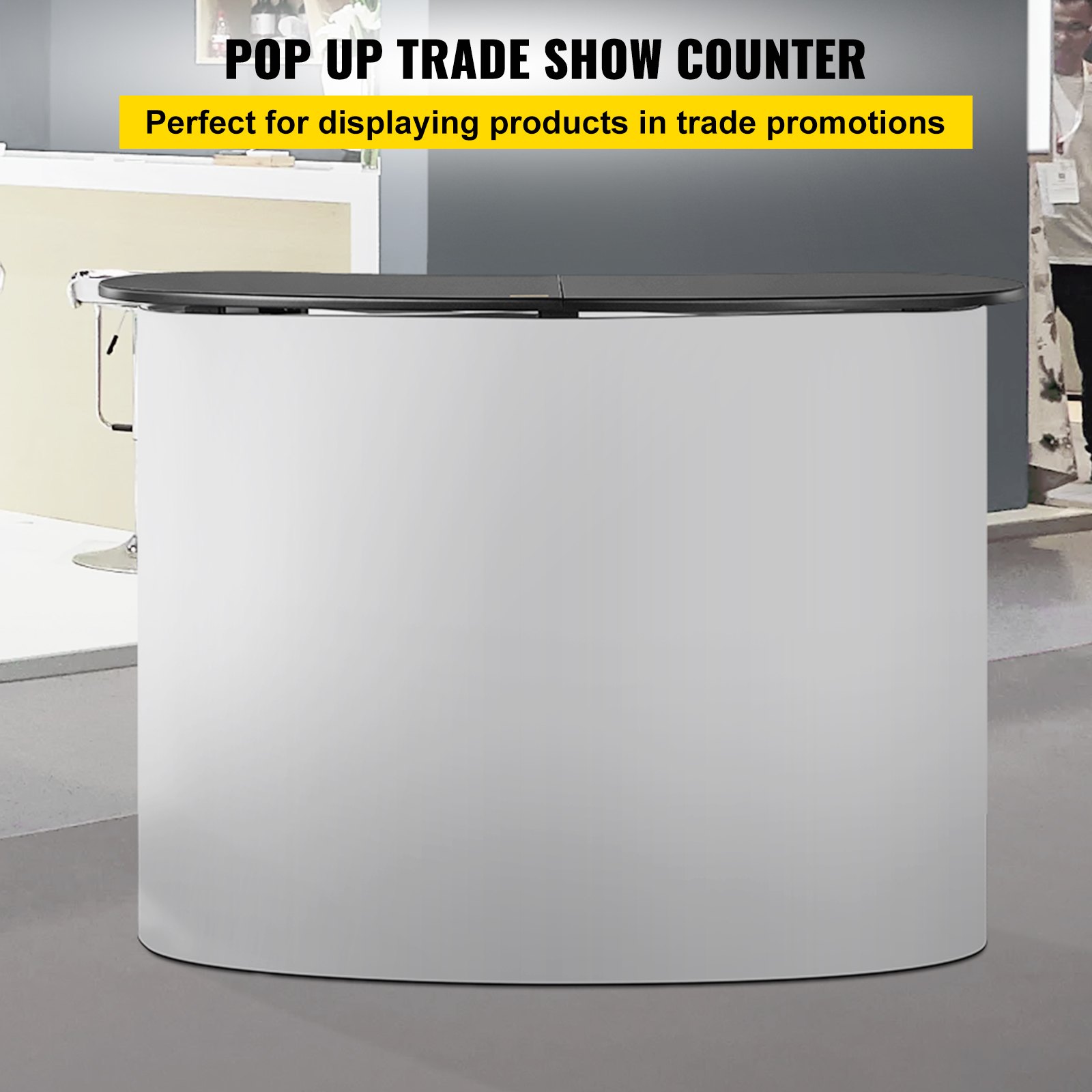 VEVOR exhibition counter stand at a trade show for displaying products.