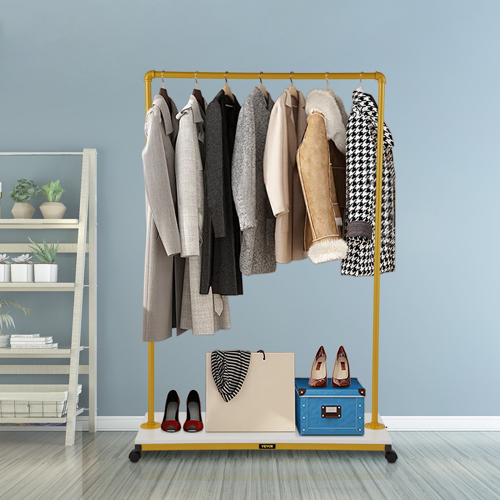 VEVOR clothing garment rack holding various coats with shoes, a bag, and decor on the bottom shelf.