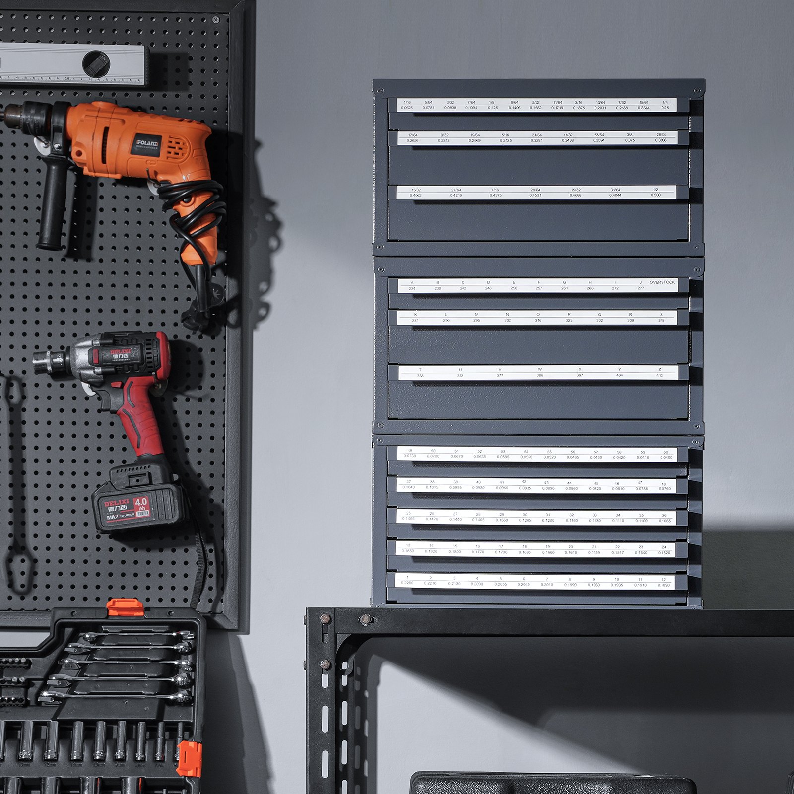 VEVOR drill bit organizer with labeled drawers beside tools on a pegboard and an organized toolbox.