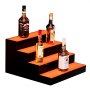 Exhibidor de botellas de licor con iluminación LED VEVOR, estante comercial iluminado de 4 niveles y 16 pulgadas para bar en casa, soporte para whisky de 4 escalones, estantes acrílicos para bebidas con control remoto RF y aplicación, e iluminación multicolor.