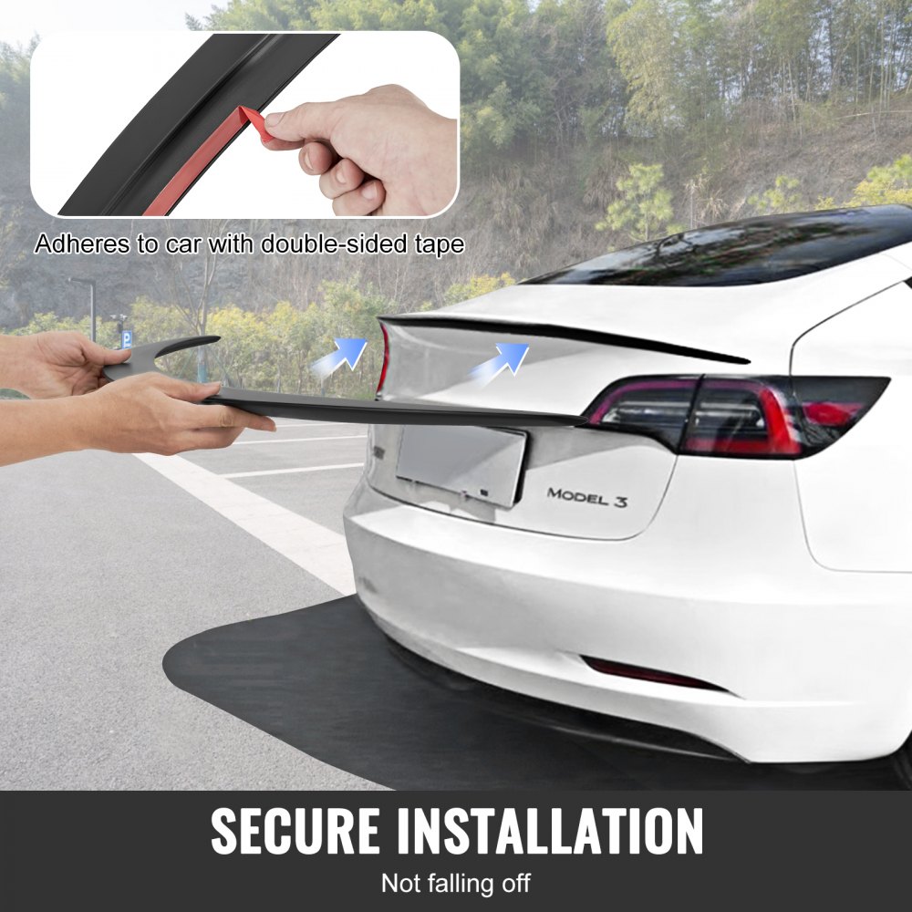 installing VEVOR tesla model 3 spoiler with double-sided tape for secure attachment.