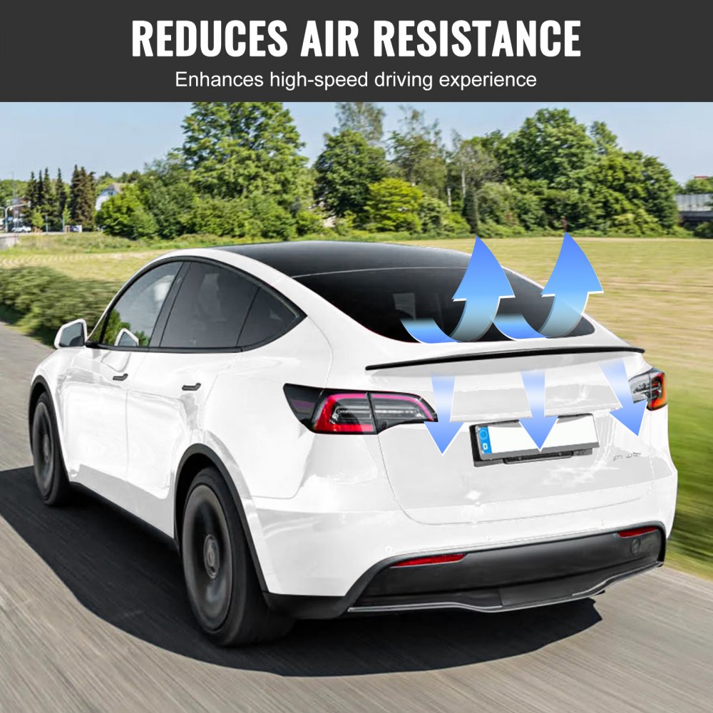 white tesla model y driving with VEVOR spoiler, showcasing airflow reduction and enhanced driving experience.