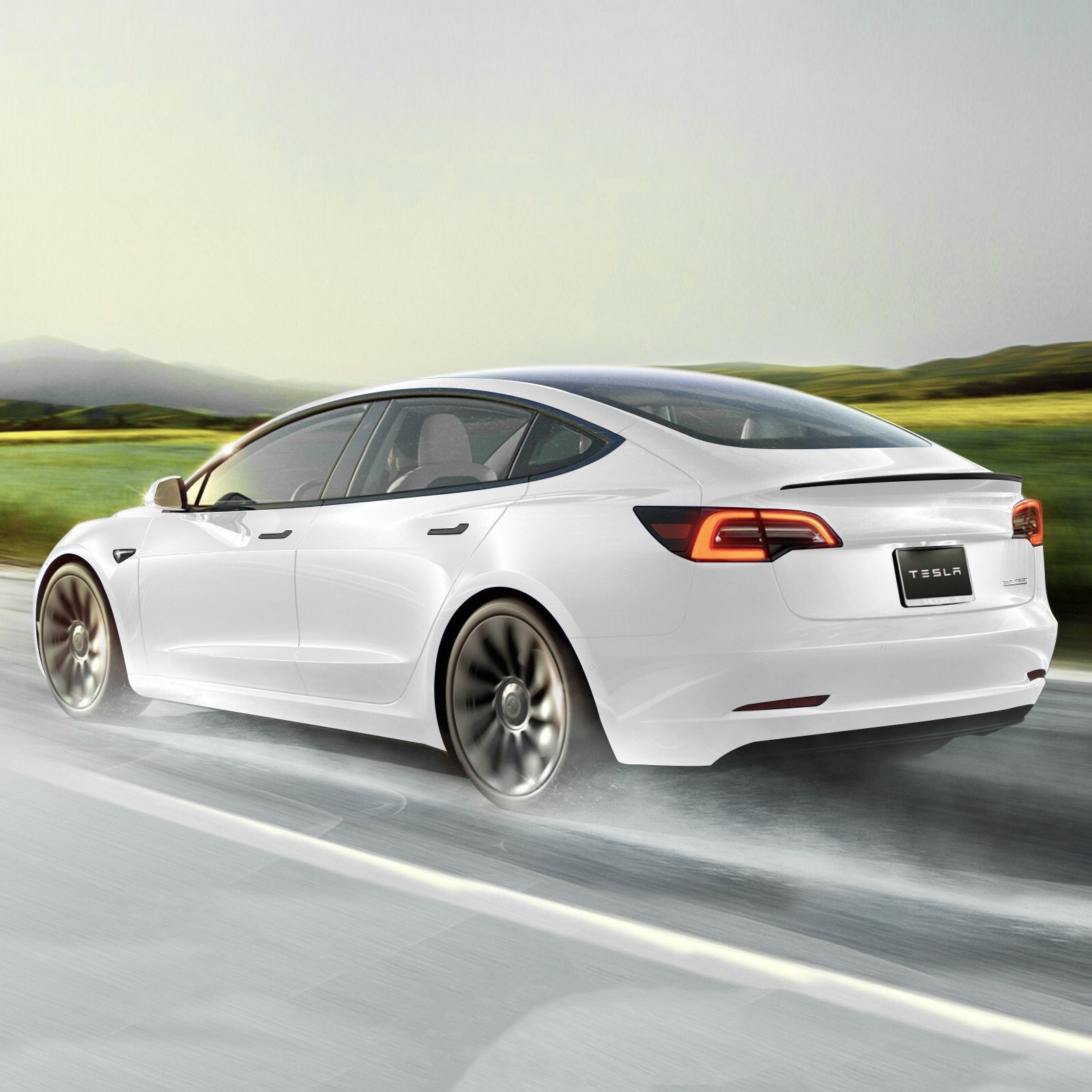 tesla model y driving fast on the road with sleek wheels and VEVOR tesla model y spoiler.